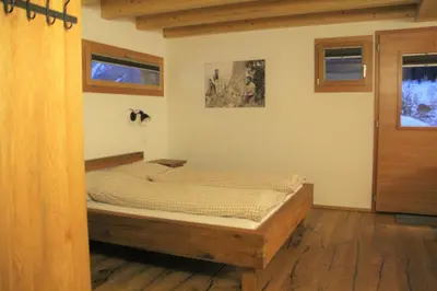 Ein Bett oder Betten in einem Zimmer der Unterkunft B&B Hängebrigga