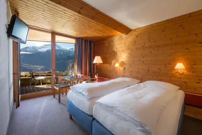 Ein Bett oder Betten in einem Zimmer der Unterkunft Hotel Panorama
