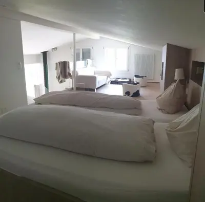Ein Bett oder Betten in einem Zimmer der Unterkunft Hotel Jungfrau Mürren