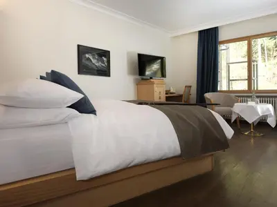 Ein Bett oder Betten in einem Zimmer der Unterkunft Beausite Park Hotel & Spa