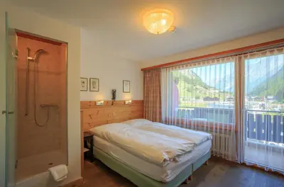 Ein Bett oder Betten in einem Zimmer der Unterkunft Arca Aparthotel & Spa