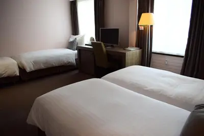 Ein Bett oder Betten in einem Zimmer der Unterkunft Hotel Central, SPA & LOUNGE BAR