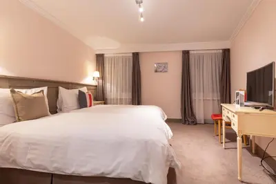 Ein Bett oder Betten in einem Zimmer der Unterkunft Hotel Central, SPA & LOUNGE BAR
