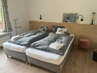 Ein Bett oder Betten in einem Zimmer der Unterkunft Zermatt Panoramic View Flat