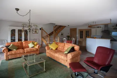 Ein Sitzbereich in der Unterkunft Chalet Kliben