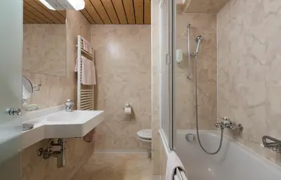 Ein Badezimmer in der Unterkunft Hotel Continental
