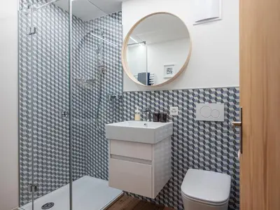 Ein Badezimmer in der Unterkunft Malteserhaus Zermatt