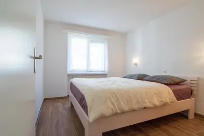 Ein Bett oder Betten in einem Zimmer der Unterkunft Egginer 4