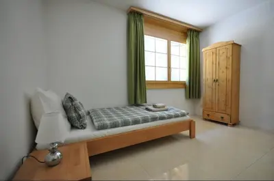Ein Bett oder Betten in einem Zimmer der Unterkunft Family Frame Apartment