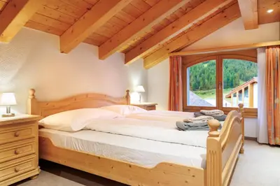 Ein Bett oder Betten in einem Zimmer der Unterkunft Dominic A