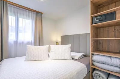 Ein Bett oder Betten in einem Zimmer der Unterkunft Chalet Graben - Aare Jungfrau AG