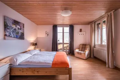 Ein Bett oder Betten in einem Zimmer der Unterkunft Chalet Cecile
