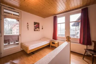 Ein Bett oder Betten in einem Zimmer der Unterkunft Chalet Cecile