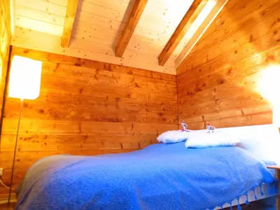 Ein Bett oder Betten in einem Zimmer der Unterkunft Chalet Safran