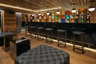Lounge oder Bar in der Unterkunft Chandolin Boutique Hotel