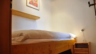 Ein Bett oder Betten in einem Zimmer der Unterkunft Chalet Goldblick
