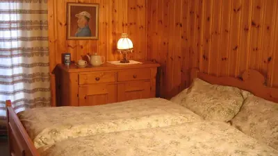 Ein Bett oder Betten in einem Zimmer der Unterkunft Chalet Goldblick