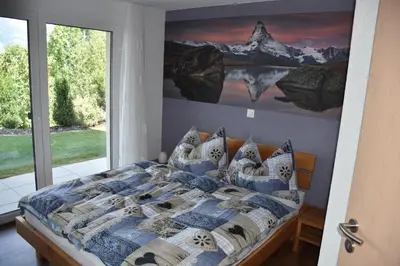 Ein Bett oder Betten in einem Zimmer der Unterkunft Panoramachalet