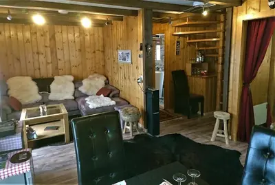 Ein Sitzbereich in der Unterkunft Chalet 