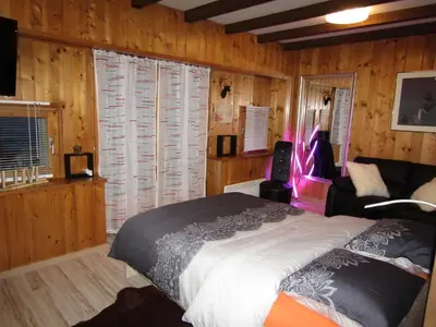 Ein Bett oder Betten in einem Zimmer der Unterkunft Chalet 