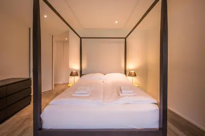 Ein Bett oder Betten in einem Zimmer der Unterkunft Independance Penthouse