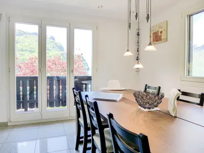 Ein Sitzbereich in der Unterkunft Holiday Home Chalet Aaregg by Interhome