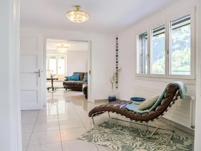 Ein Sitzbereich in der Unterkunft Holiday Home Chalet Aaregg by Interhome