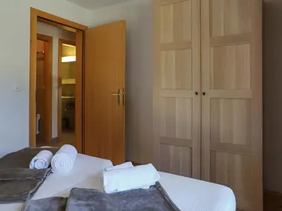 Ein Bett oder Betten in einem Zimmer der Unterkunft Chalet Edelweiss by Interhome