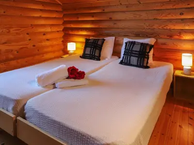 Ein Bett oder Betten in einem Zimmer der Unterkunft Chalet Edelweiss by Interhome