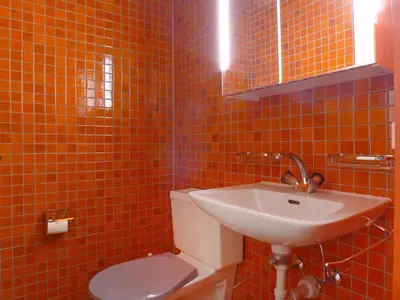 Ein Badezimmer in der Unterkunft Apartment Im Gruebi Apt- 10 by Interhome
