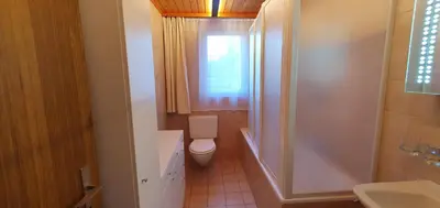 Ein Badezimmer in der Unterkunft Chalet Schneevogul