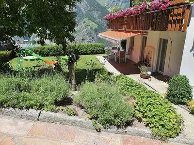 Ein Garten an der Unterkunft Chalet Schneevogul