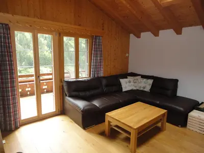 Ein Sitzbereich in der Unterkunft Chalet Julian