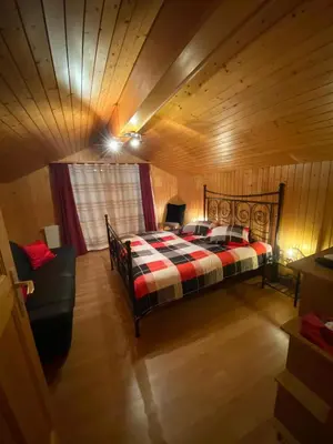 Ein Bett oder Betten in einem Zimmer der Unterkunft Chalet Burglauenen Grindelwald