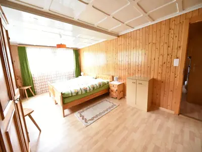 Ein Bett oder Betten in einem Zimmer der Unterkunft Cozy Stay near Aletsch