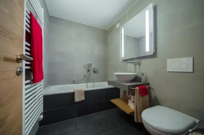 Ein Badezimmer in der Unterkunft Apartment Riffelberg