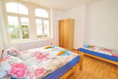 Ein Bett oder Betten in einem Zimmer der Unterkunft Ferrari Apartment