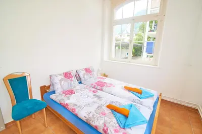 Ein Bett oder Betten in einem Zimmer der Unterkunft Ferrari Apartment