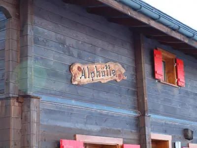 Ein Zertifikat, Auszeichnung, Logo oder anderes Dokument, das in der Unterkunft Chalet Alphütte ausgestellt ist