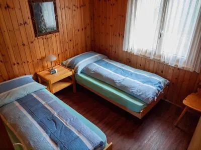 Ein Bett oder Betten in einem Zimmer der Unterkunft Chalet Bärgsunna