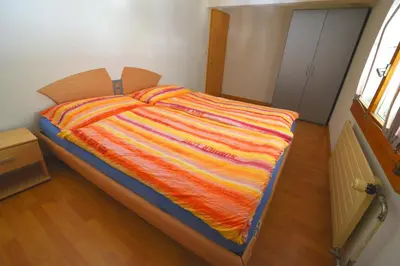 Ein Bett oder Betten in einem Zimmer der Unterkunft The River Holiday Apartment