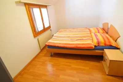 Ein Bett oder Betten in einem Zimmer der Unterkunft The River Holiday Apartment