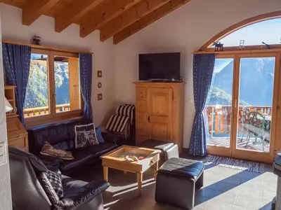 Ein Sitzbereich in der Unterkunft Chalet Bergkristall