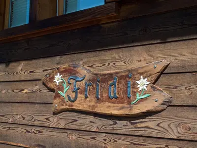 Ein Zertifikat, Auszeichnung, Logo oder anderes Dokument, das in der Unterkunft Chalet Fridi ausgestellt ist