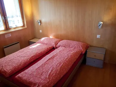 Ein Bett oder Betten in einem Zimmer der Unterkunft Chalet Fridi