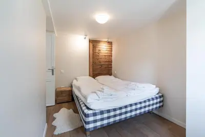 Ein Bett oder Betten in einem Zimmer der Unterkunft Haus Kirchplatz 4 by Zermatt Premium Apartments