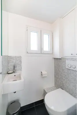 Ein Badezimmer in der Unterkunft Haus Kirchplatz 4 by Zermatt Premium Apartments
