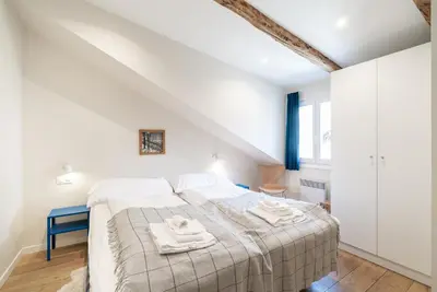 Ein Bett oder Betten in einem Zimmer der Unterkunft Haus Kirchplatz 4 by Zermatt Premium Apartments