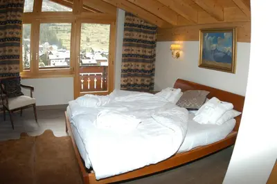 Ein Bett oder Betten in einem Zimmer der Unterkunft Chalet Guggenbiel