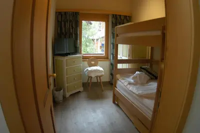 Ein Bett oder Betten in einem Zimmer der Unterkunft Chalet Guggenbiel